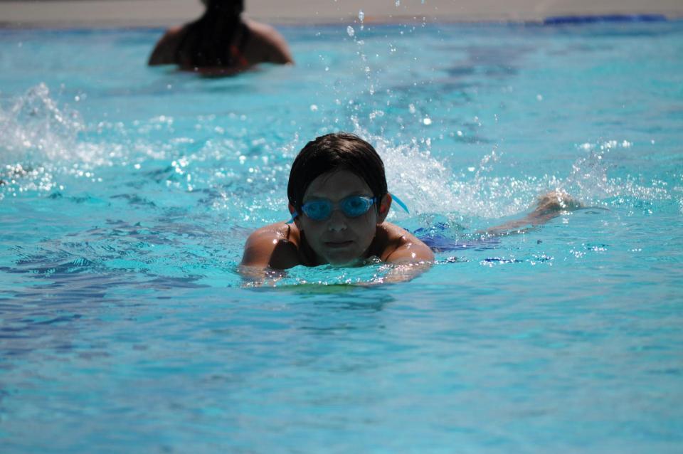 Boy swimming at Pawley Pool photo